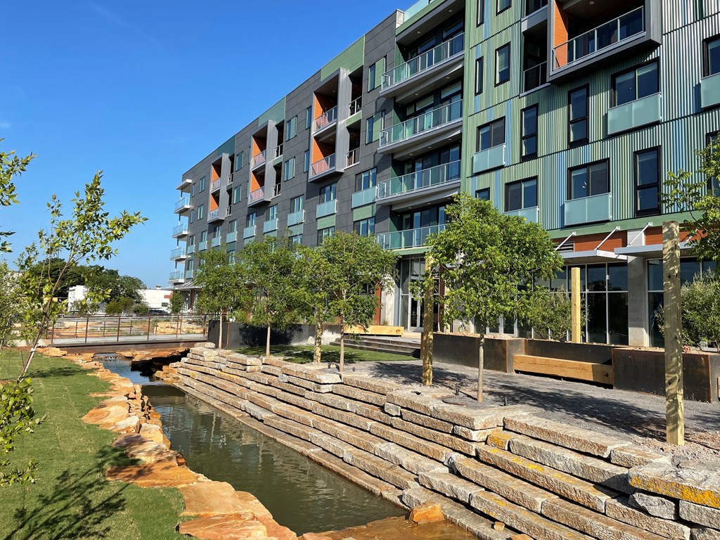 a building with a river in front of it