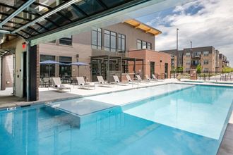 Swimming Pool Area With Shaded Chairs Swimming Pool Area With Shaded Chairs at Railway Flats Apartments, Colorado, 80538
