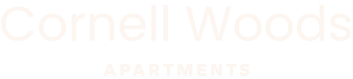 The image is a sign for Cornell Woods Apartments.