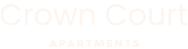 A sign that says Crown Court Apartments.