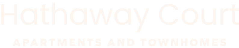 A sign that says Hathaway Court Apartments and Townhomes.