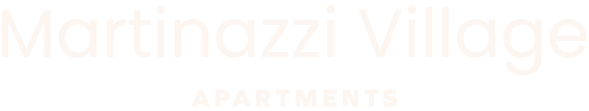 A sign that says Martinazzi Village Apartments.