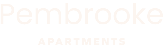 A sign that says Pembrooke Apartments.