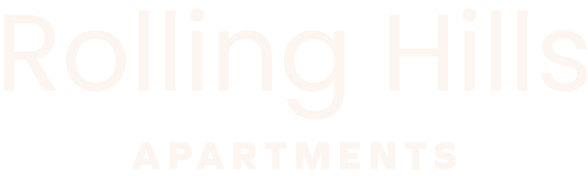 A sign that says "Rolling Hills Apartments".