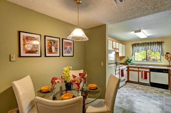 Chambers Creek Apartments Dining Room with table