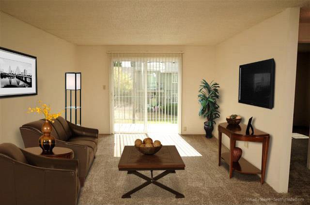 a living room with a couch and a coffee table