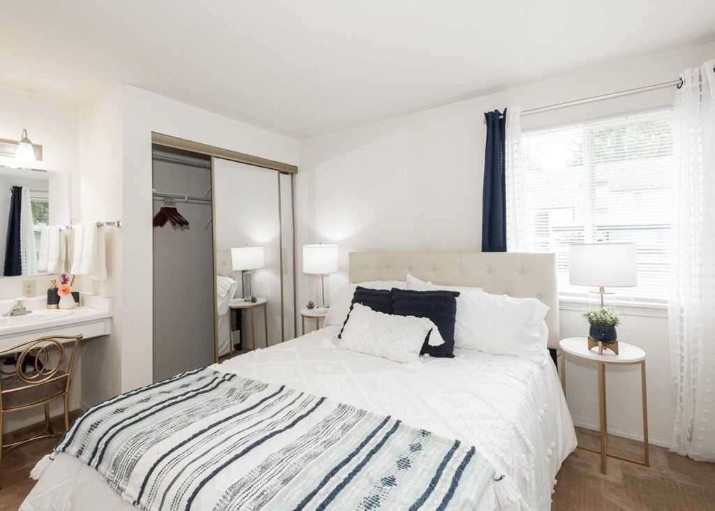Creekside Village model primary bedroom and vanity