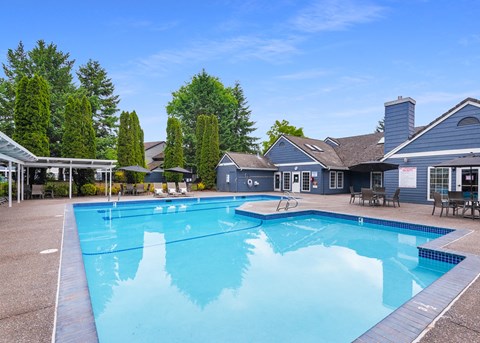 Pool With Relaxing Chairs at Creekside Village, Oregon, 97401
