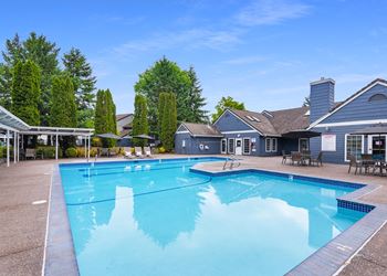 Creekside Village outdoor swimming pool clubhouse view
