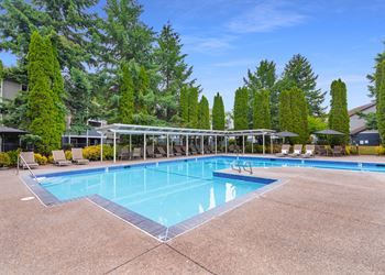 Creekside Village outdoor swimming pool and pool deck with furniture