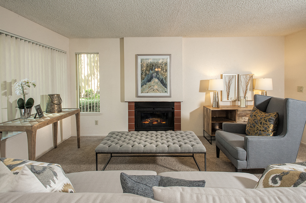 Model Living Room & Fireplace at Delta Pointe Apartments, Sacramento, CA