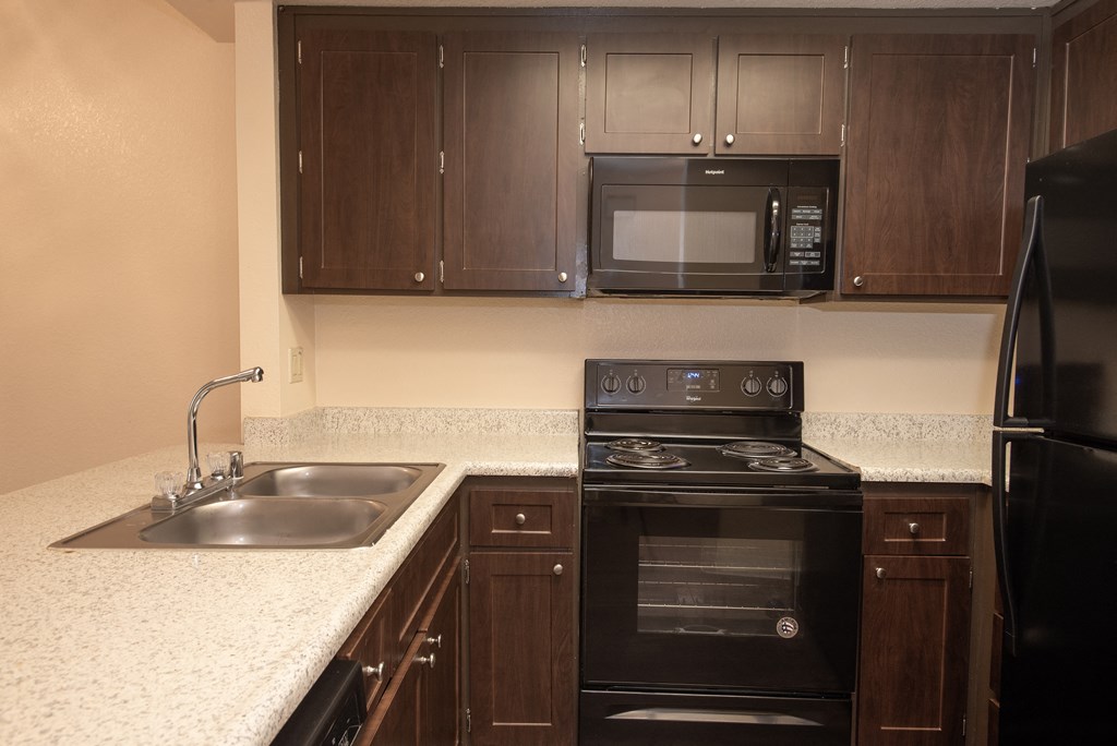 vacant kitchen at Delta Pointe Apartments, Sacramento, 95833