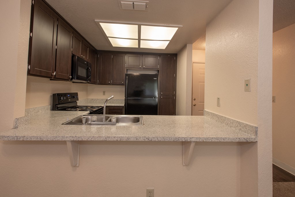 vacant kitchen bar at Delta Pointe Apartments, Sacramento