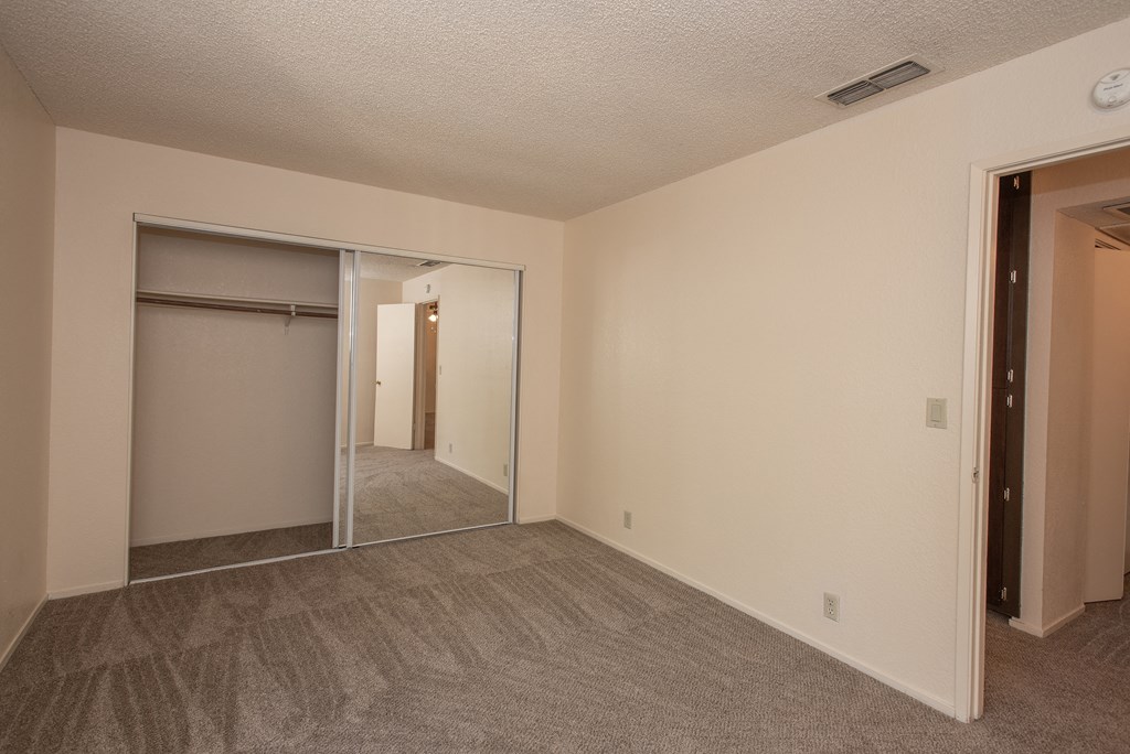 vacant second bedroom at Delta Pointe Apartments, Sacramento