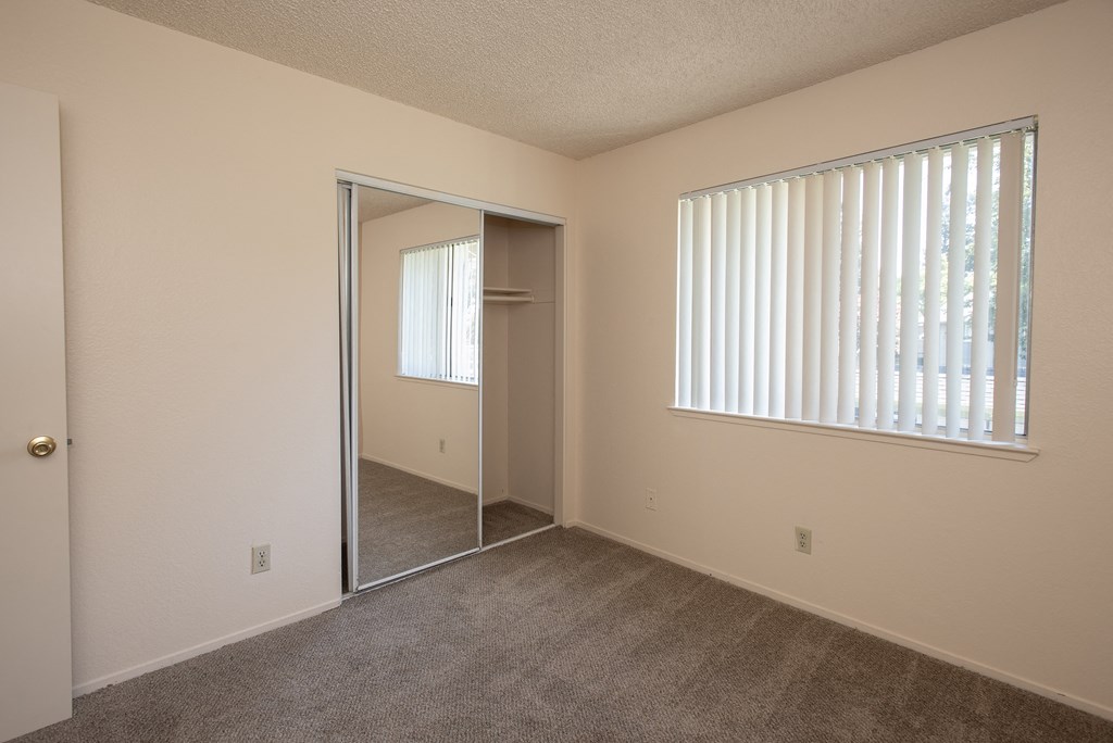 vacant second bedroom at Delta Pointe Apartments, California