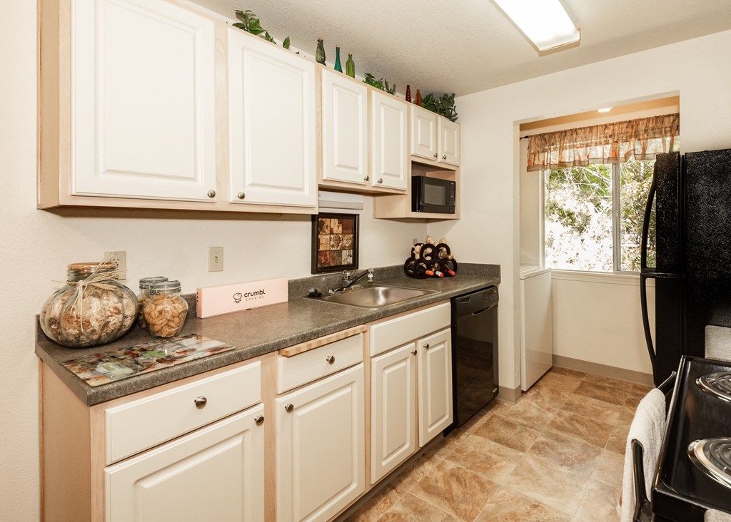 Kings Court Beaverton OR model kitchen and laundry