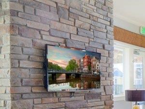 The Landing Apartments Clubhouse Interior Seating Area & Fireplace
