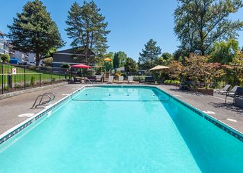 Shadow Hills seasonal swimming pool with with and lounge chairs