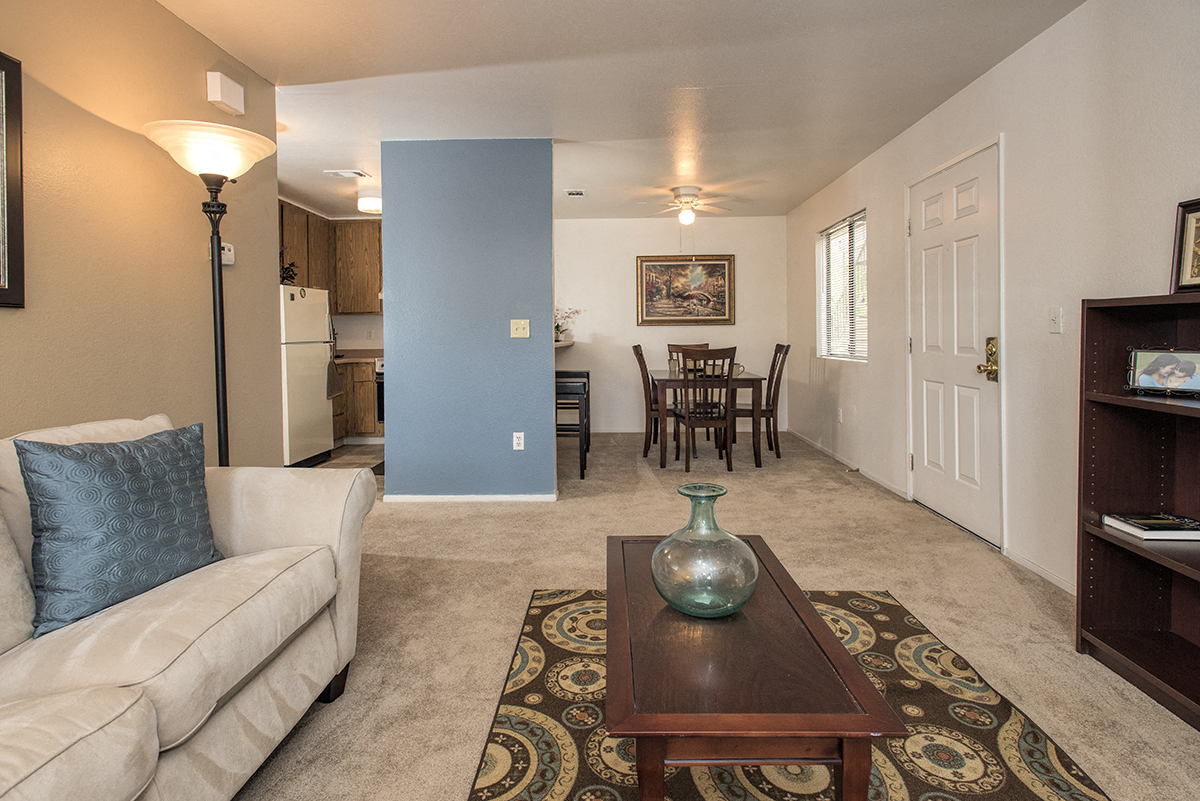 a living room with a couch and a coffee table