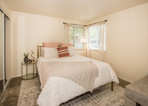 Model Primary Bedroom at St. Mary's Woods Apartments, Beaverton, OR