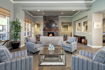 Stoneridge Clubhouse seating areas with fireplace