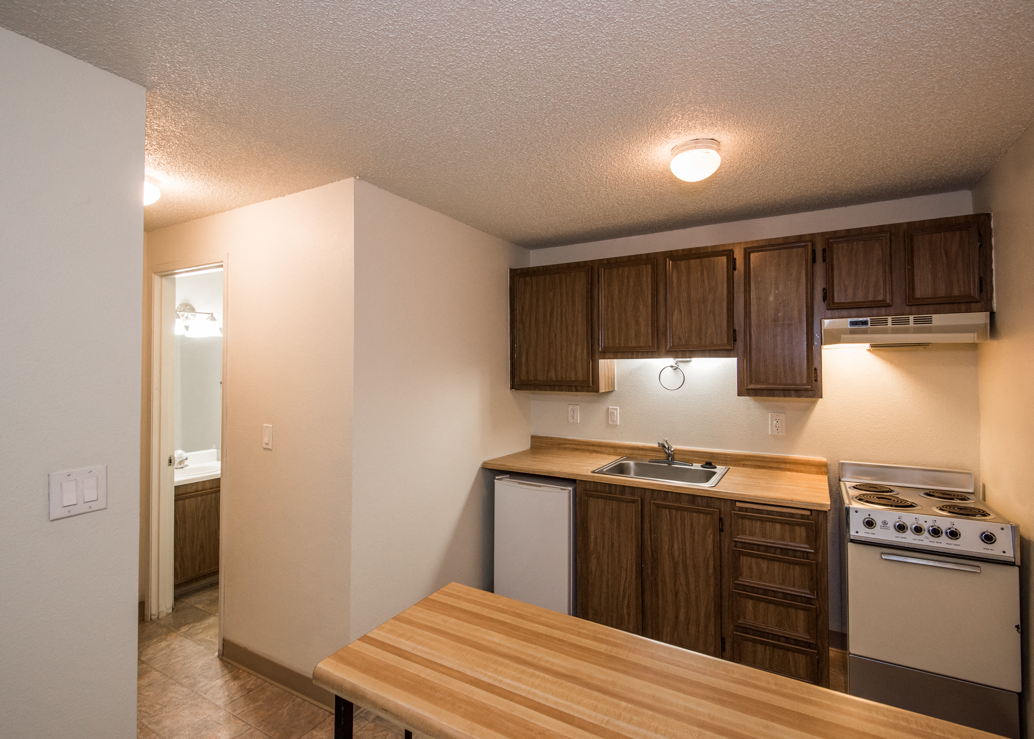 Todd Village Vacant Studio Apartment Kitchen at Todd Village Apartments, Tualatin, OR