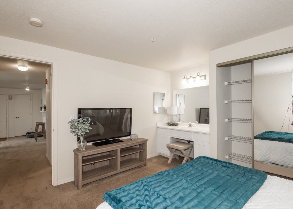 Valley River Court model primary bedroom and vanity