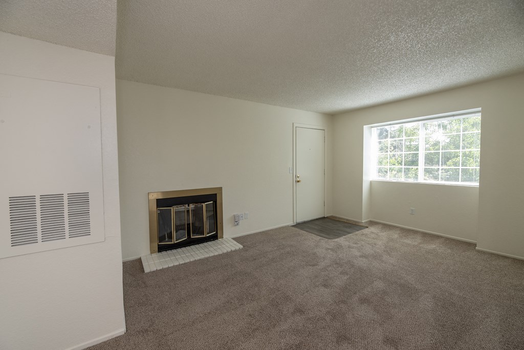 vacant 2x2 living room and entry at Woodbridge Apartments, California, 95833