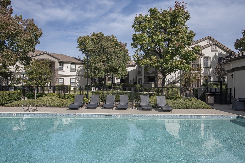 Stoneridge apartments, Roseville, CA, pool and lounge chairs