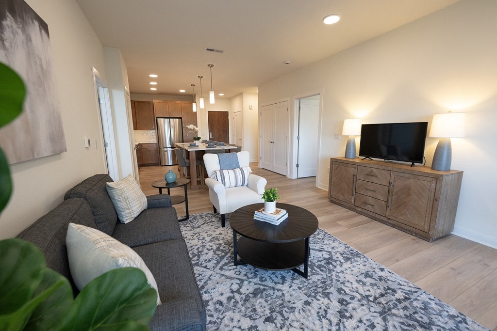 a living room with a couch and a table