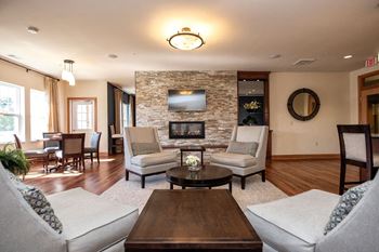 a living room with two couches and a table