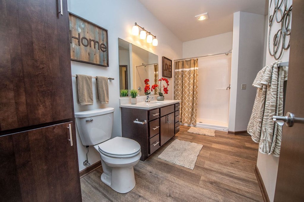 a bathroom with a toilet and a sink