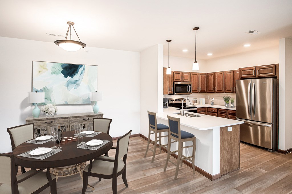 a kitchen and dining area in a 555 waverly unit