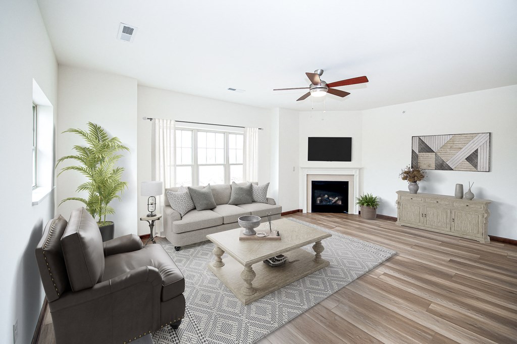 a living room with white walls and a white fireplace with a tv above it