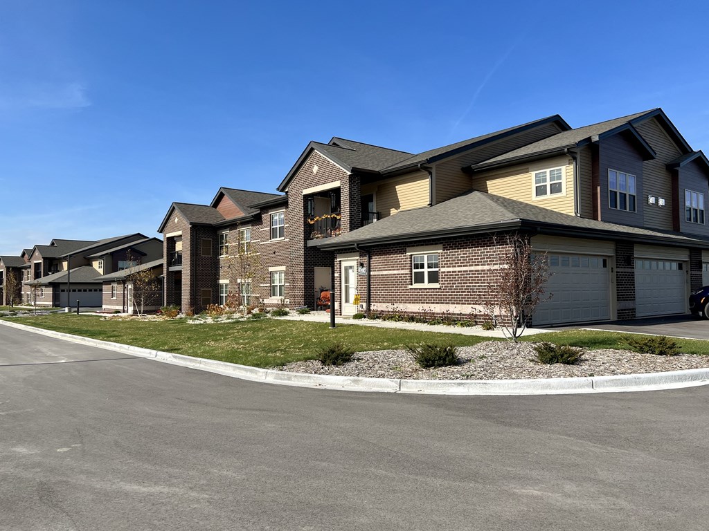 a row of houses on the side of a street