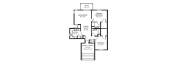 A black and white image of a house floor plan.
