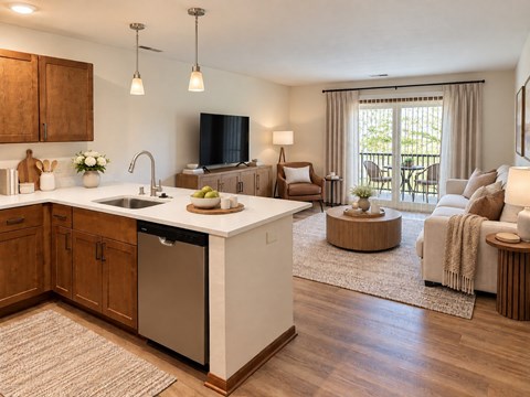 A modern kitchen with wooden cabinets and a large island.