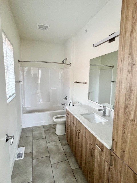 a bathroom with a sink and a toilet