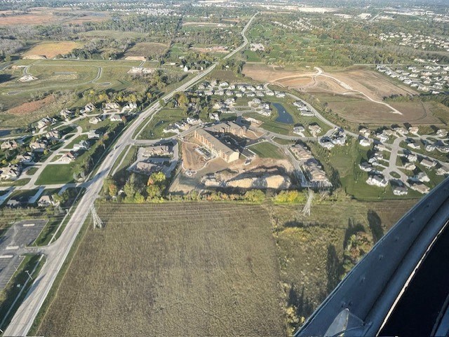 an aerial view of a city from an airplane