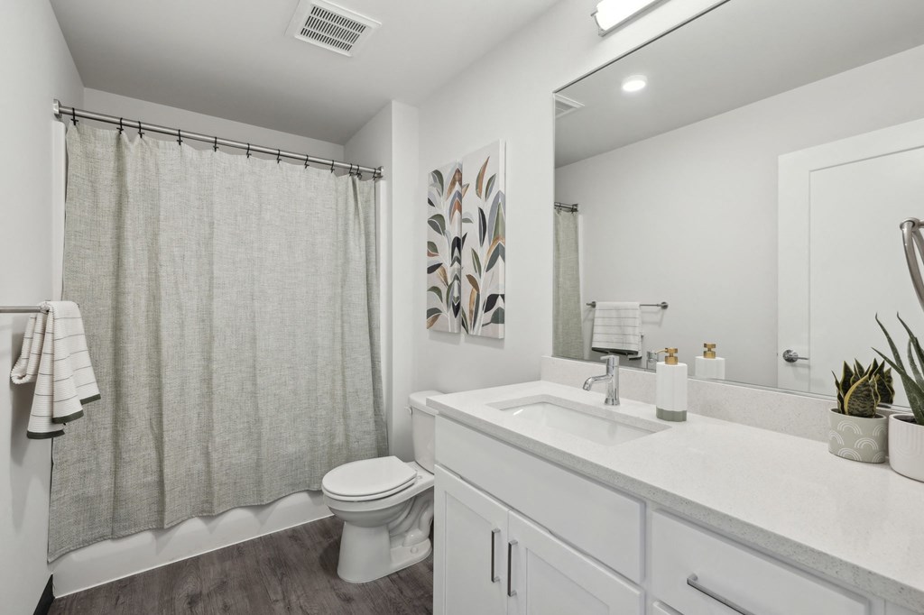 Bathroom with a sink and a mirror at AVIVA Apartments in Gresham Oregon
