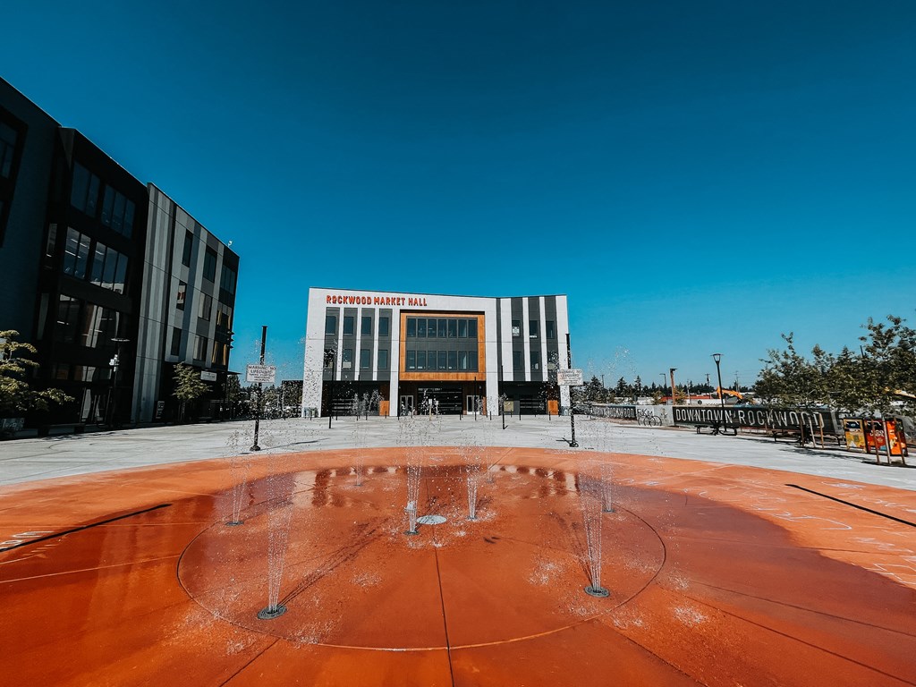 Splash pad in front of Rockwood Market Hall at AVIVA Apartments in Gresham Oregon