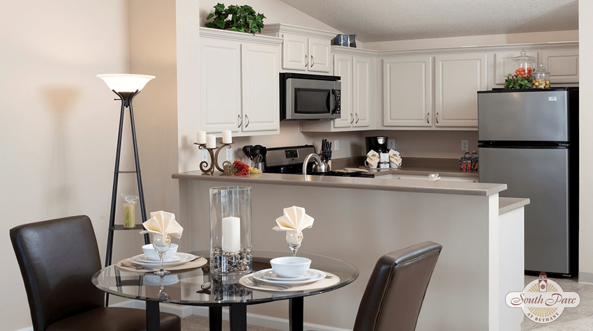a kitchen and dining room with a table and chairs - Photo Gallery