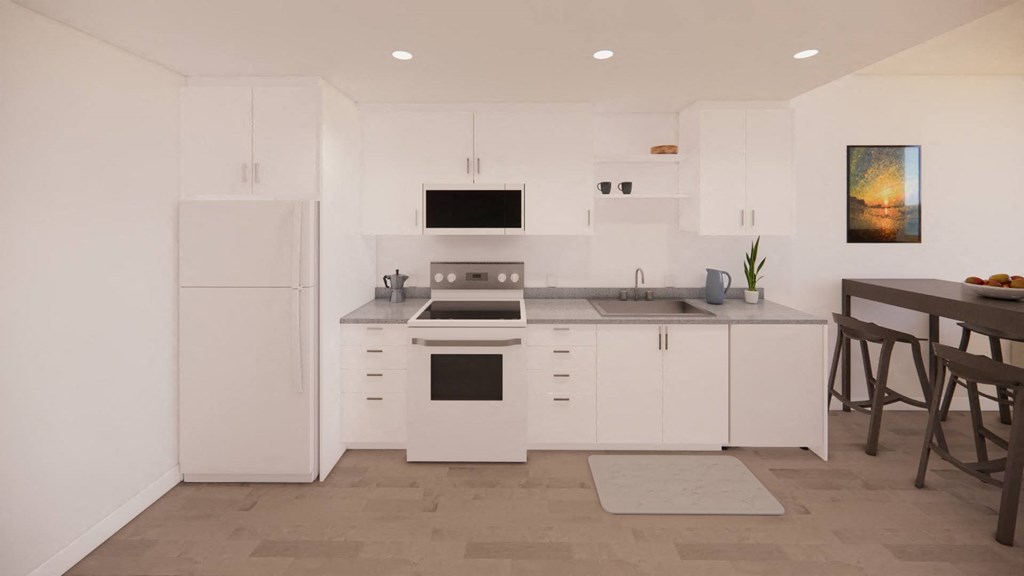 a white kitchen with a sink and a stove