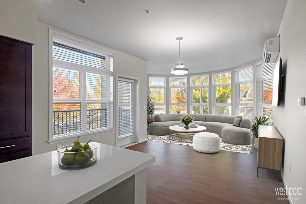 Living room with floor to ceiling windows - apartment at west parc in bethany village located near portland and beaverton oregon