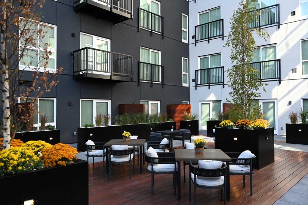 Terrace with BBQ grills at AVIVA Apartments in Gresham Oregon