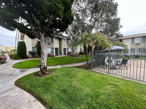 Beautiful landscaping and walkways at IKARIA Apartments in Santee, California.