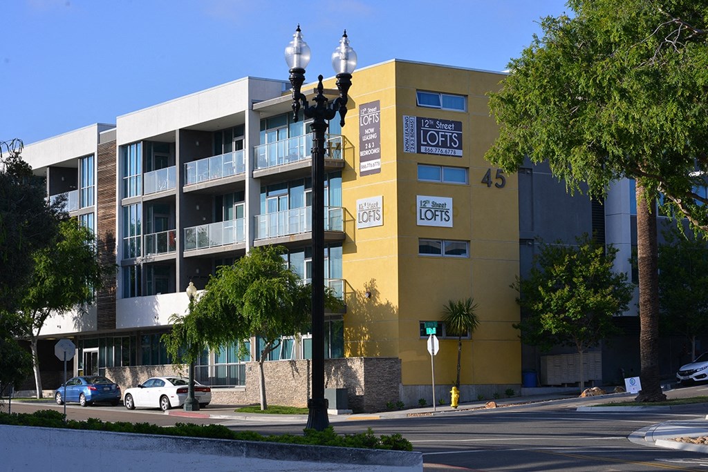 Corner street view of 12th Street Lofts in National City, California.