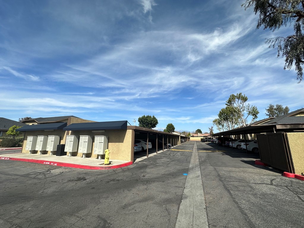 Parking and mailboxes at Riverdale Apartment Homes in Hemet, California.