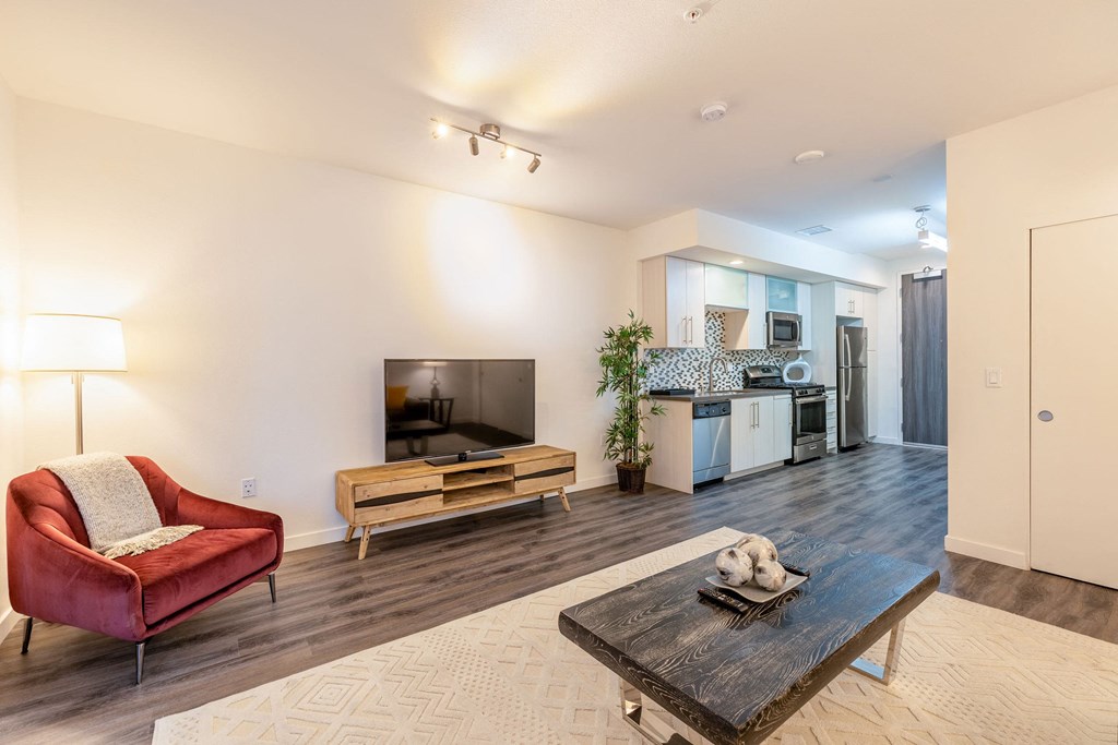a living room with a couch and a table