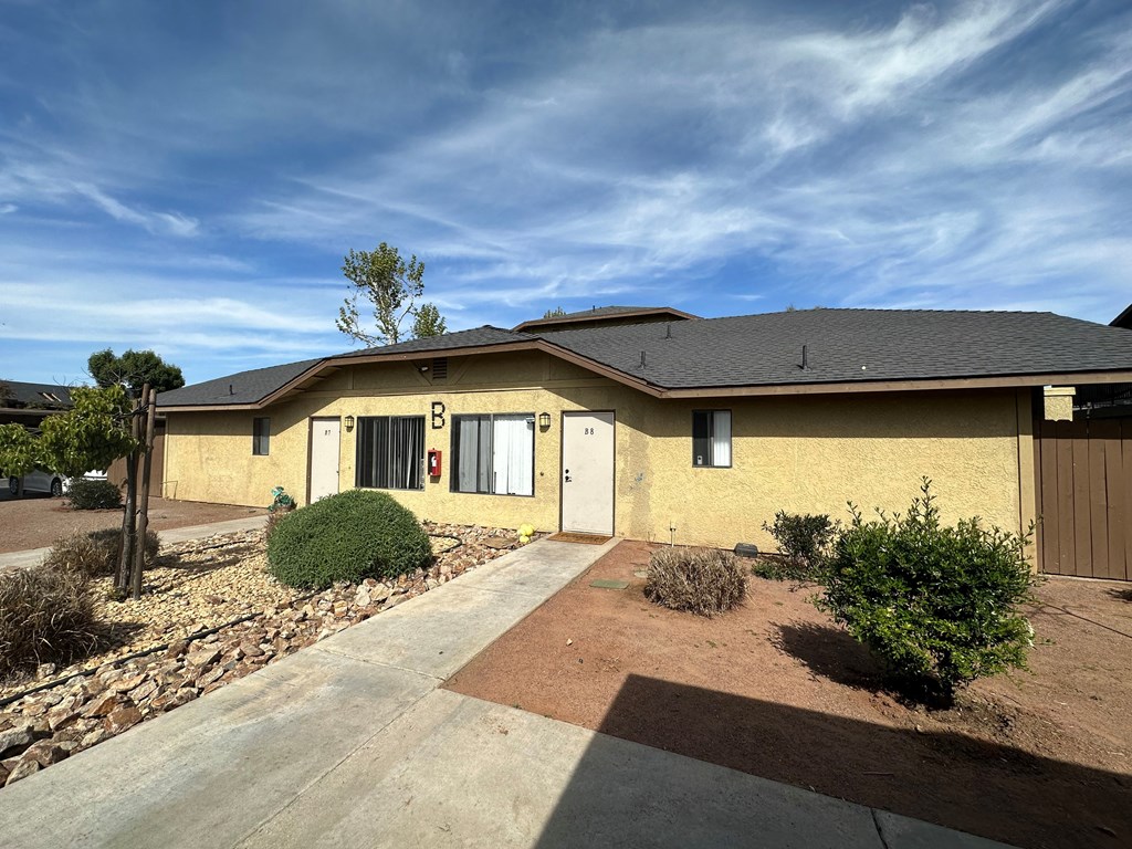 Desert garden in front of apartments at Riverdale Apartment Homes in Hemet, California.